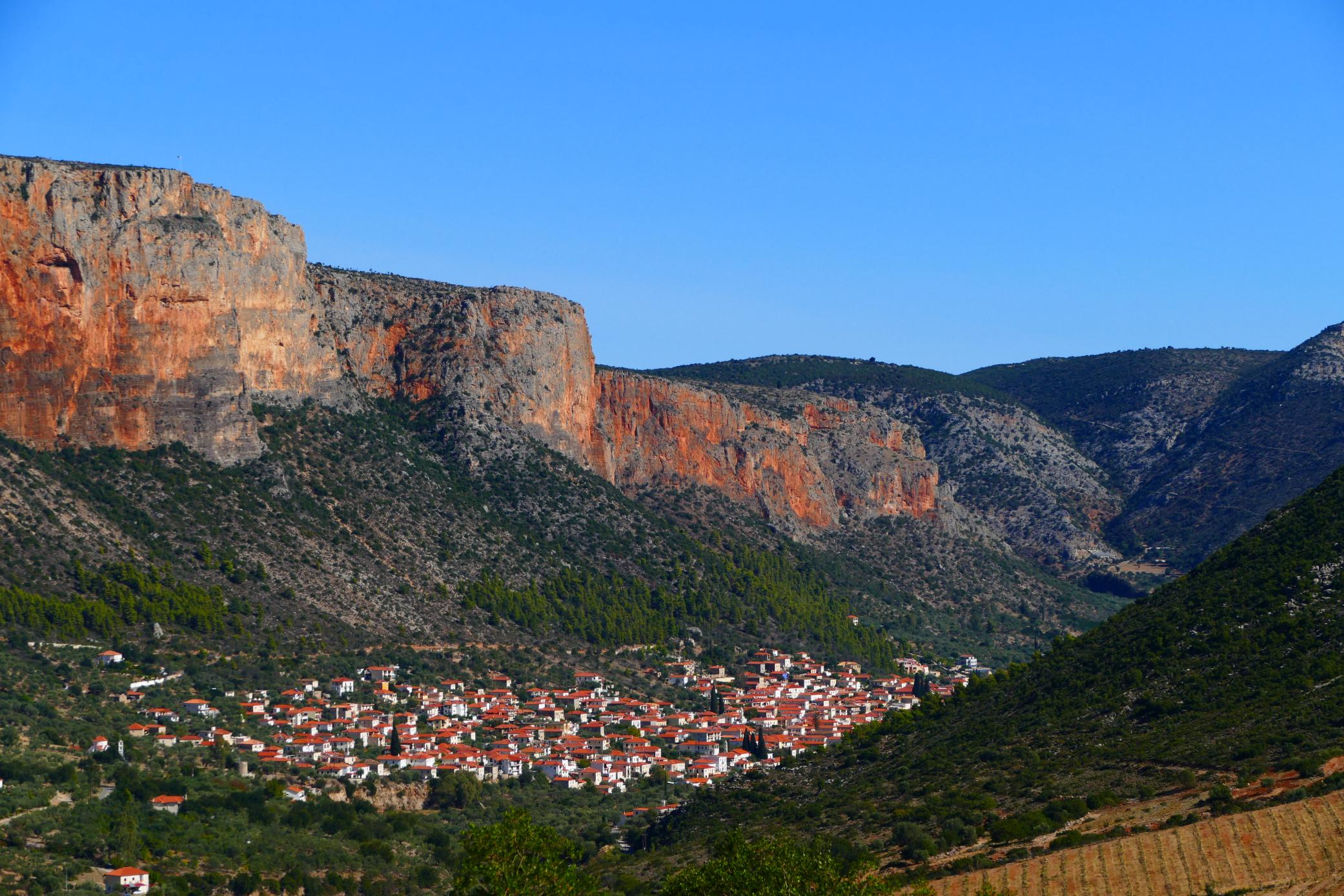 Leonidio village Arcadia Peloponnese Greece red rock cliffs aerial view